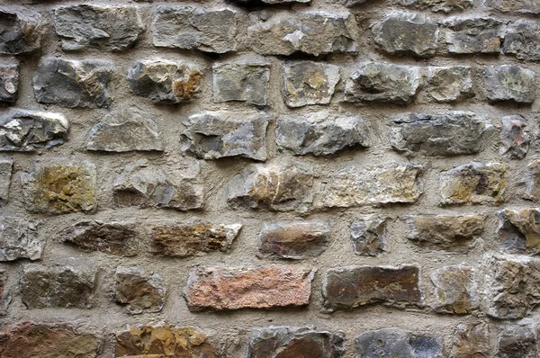 Muster einer antiken Steinmauer in Florenz, Italien — Stockfoto