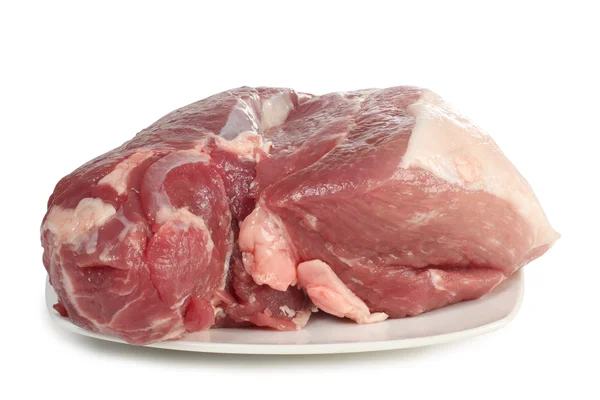Crudo di maiale sul piatto — Foto Stock