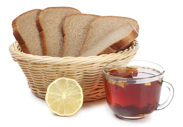 Cesta de pão e chá — Fotografia de Stock