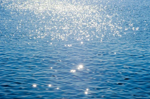 Deniz Arka Planındaki Işıklar Dalgalar — Stok fotoğraf