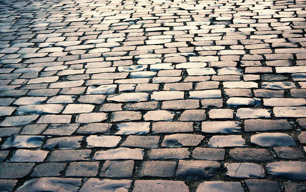 Cobbled road as background