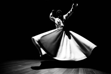 the image of a whirling Dervish in the darkness clipart