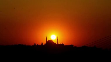 İstanbul 'da Süleyman Camii' nin arkasında gün batımı