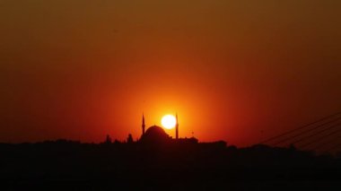 İstanbul 'da Süleyman Camii' nin arkasında gün batımı