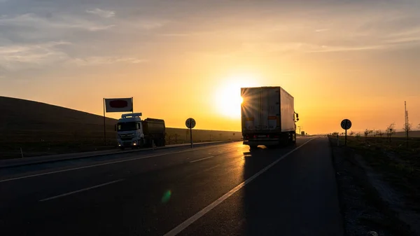 Vehicles Exporting Sunrise View Stockfoto