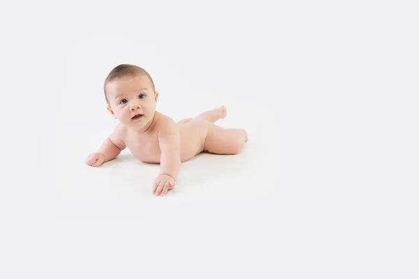 Bebé acostado en el estómago Desnudo — Foto de Stock