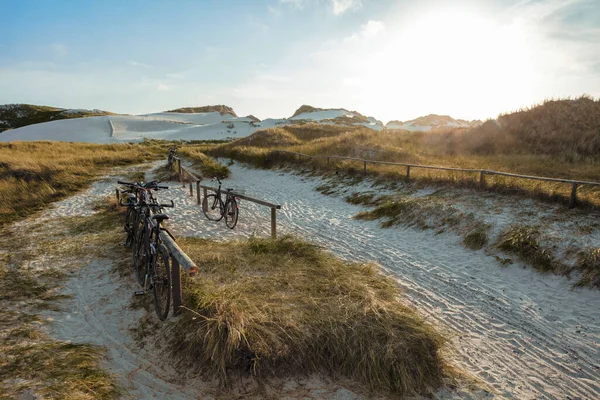 Several Bikes Resting Bike Parking Place Sand Dunes Coastal Landscape — Stock Photo, Image