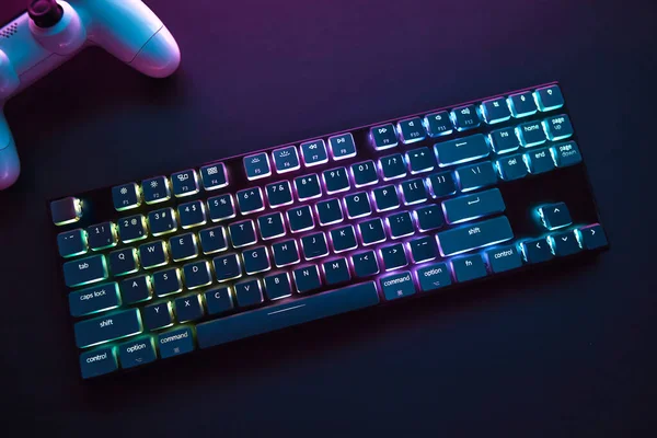 Top View Color Backlighted Gaming Accessories Laying Dark Desk Professional — Stock Photo, Image