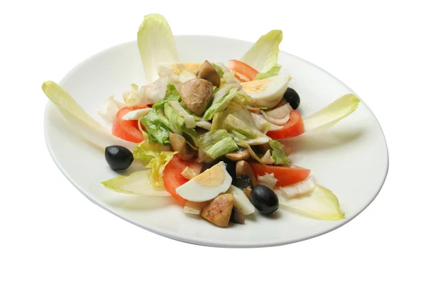 Salad with mushrooms, eggs, tomatoes and olives — Stock Photo, Image