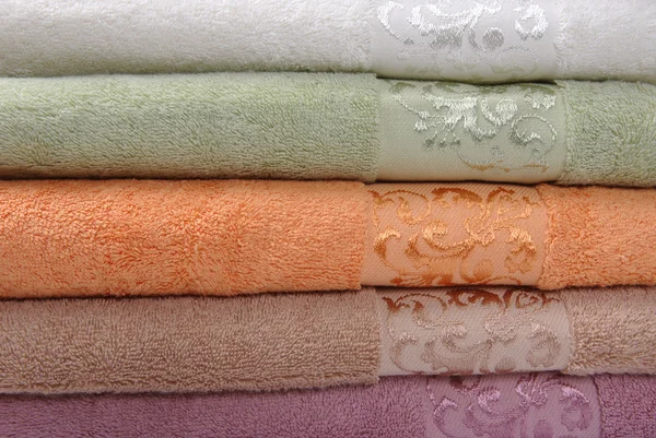 Coloured towels, isolated on a white — Stock Photo, Image