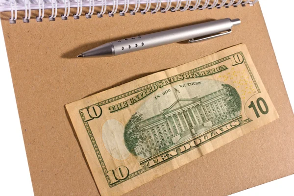 Tíz dollárt, notebook — Stock Fotó