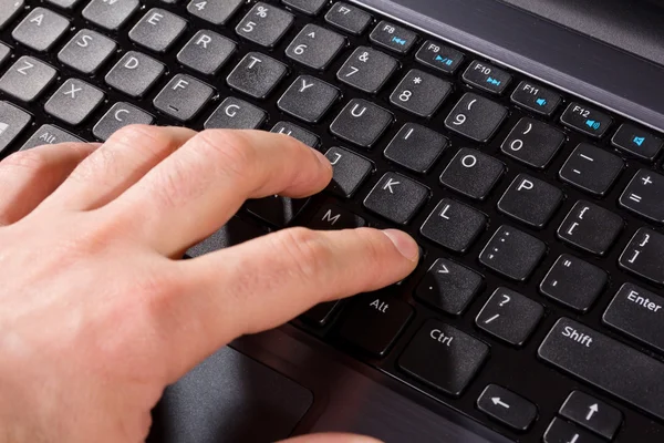 Hand on the keyboard of computer — Stock Photo, Image