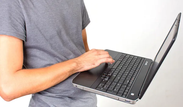 Laptop in hand — Stock Photo, Image