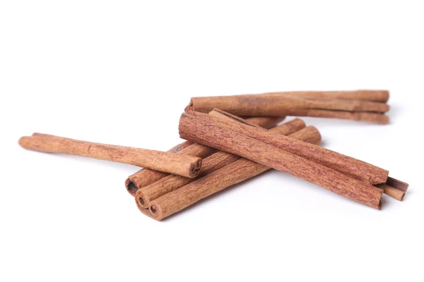 Cinnamon on white — Stock Photo, Image