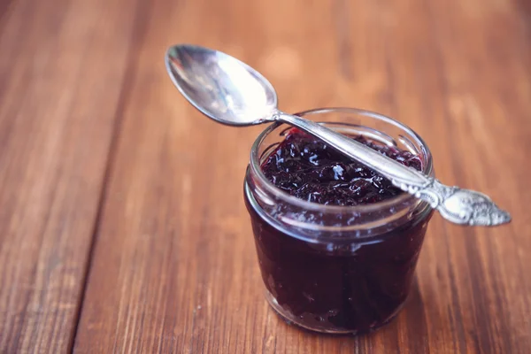 Jam with spoon — Stock Photo, Image