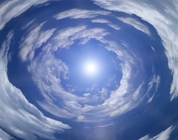 Cloudy sky with the sun in the middle