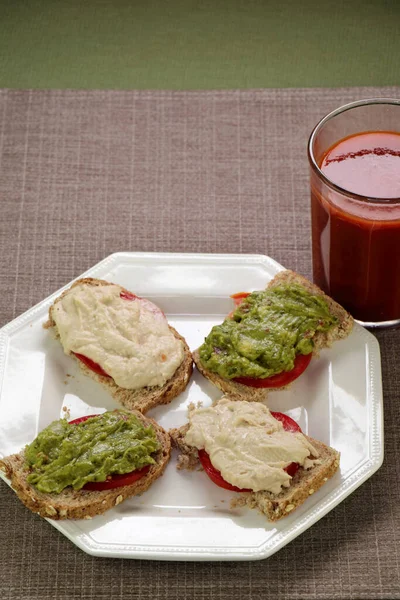 Four Half Slices Open Faced Sandwiches Hummus Tomato Guacamole Tomato — Stock Photo, Image