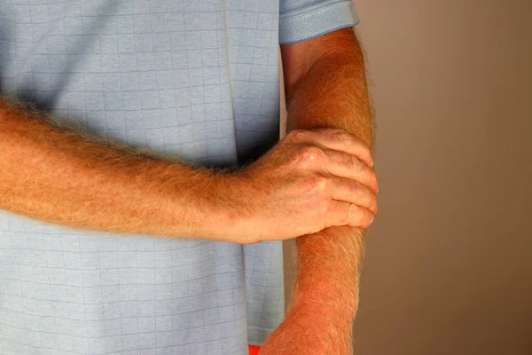 Front View Close Mature Caucasian Male Massaging His Left Forearm — Foto Stock