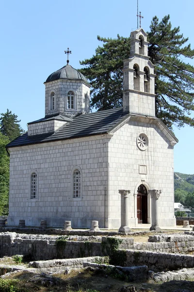 Ruins and church — Stock Photo, Image