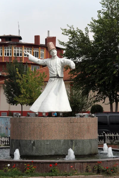 Dervish and fountain — Stock Photo, Image