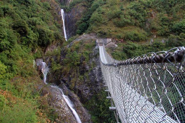 Waterfall and bridge — Stock Photo, Image
