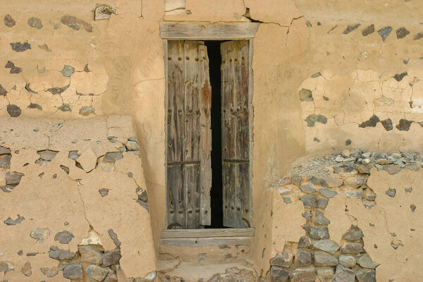 The old door at the defensive tower above The Palace at Wadi Al Hayl in the Emirate of Fujairah in the United Arab Emirates.