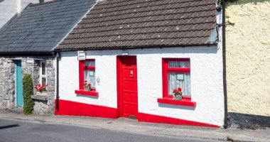 CONG, IRELAND - AUGUST 13, 2022: The Dying Man House (from the 1952 Oscar-winning film The Quiet Man) in a  street in the village of Cong in Ireland.
