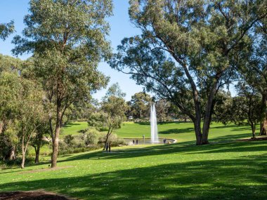PERTH, AUSTRALIA - SEPTEMBER 9, 2022: The Pioneer Women's Memorial is located in the Western Australian Botanic Garden in Kings Park in Perth, Western Australia. It comprises a lake, a statue and a fountain.