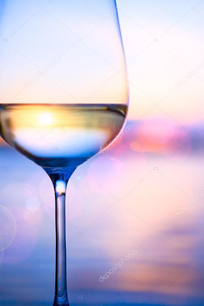 Art white wine on the summer sea background