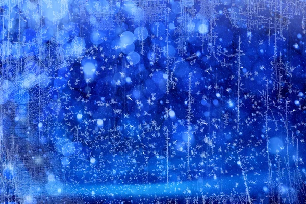 Arte luzes de Natal no fundo azul — Fotografia de Stock