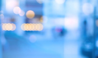 abstract background with bokeh defocused lights and shadow from cityscape at nigh