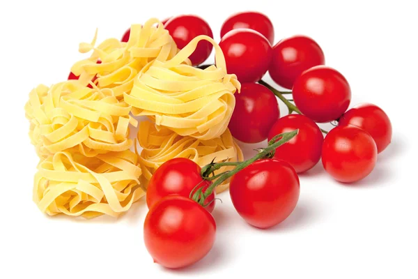 Tomatoes and pasta for fettuccini — Stock Photo, Image