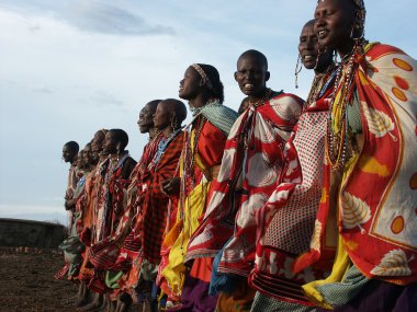 Masai Mara, Kenya - January 6: Maasai women in traditional cloth clipart