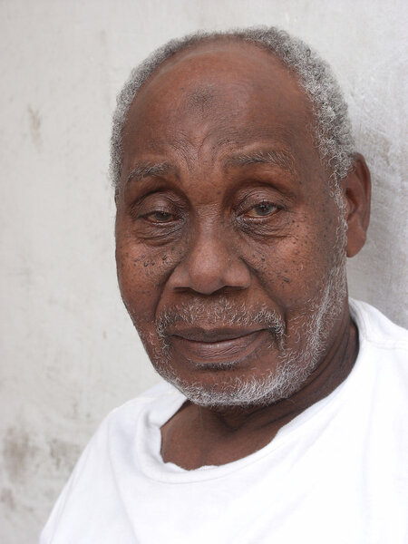 Mombasa, Kenya - January 5: An older Kenyan Swahili man poses fo