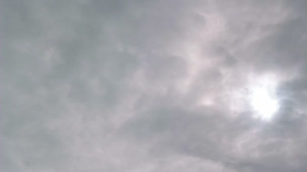 Sun covered by clouds — Stock Video