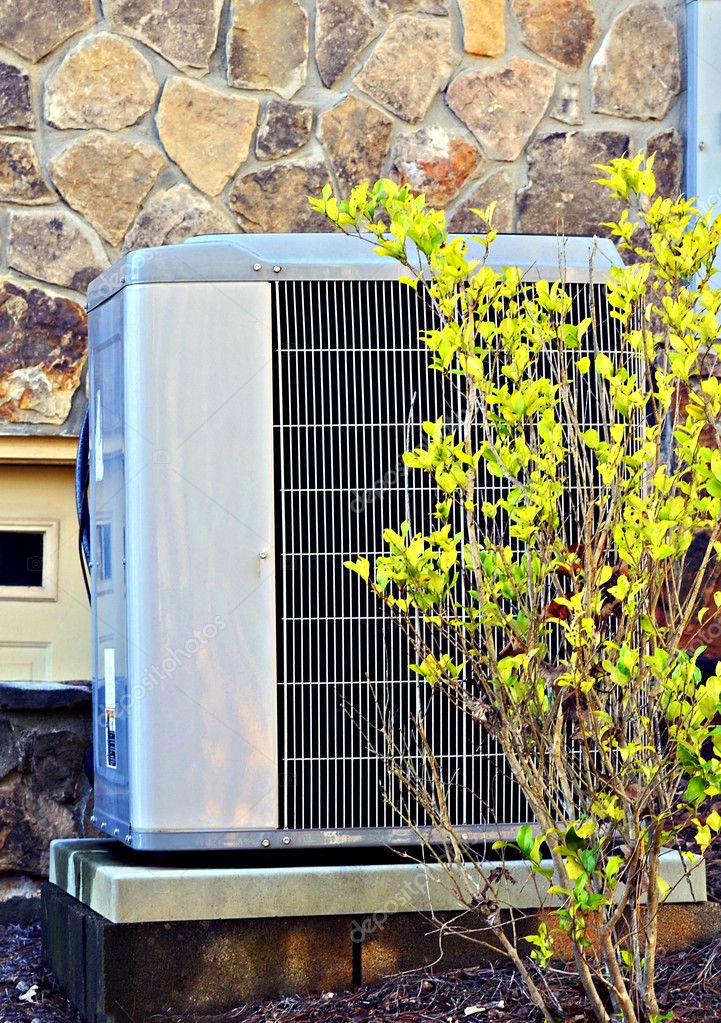 Air Conditioner / Heating Unit on a House Stock Photo by ©noonie 17715321