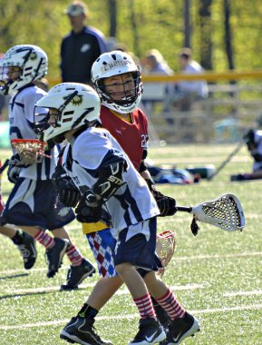 Küçük çocuğun Lacrosse