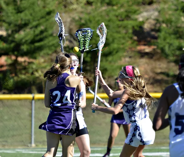 Chicas jóvenes Lacrosse Jugadores —  Fotos de Stock