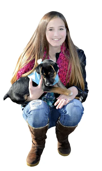 Adolescente arrodillándose con cachorro — Foto de Stock