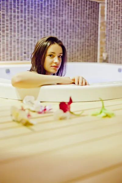 Girl in hot tub — Stock Photo, Image