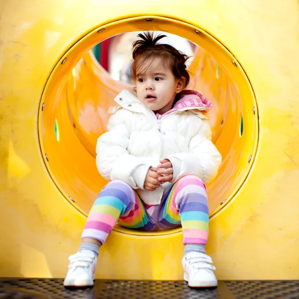 Menina no parque infantil — Fotografia de Stock