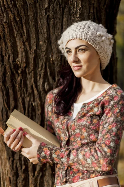 Young woman with a book — Stock Photo, Image