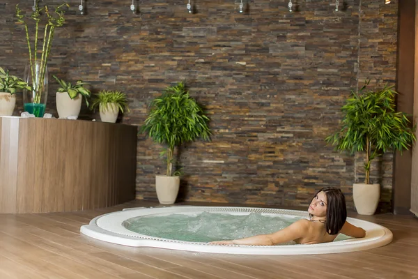 Young woman in the hot tub — Stock Photo, Image