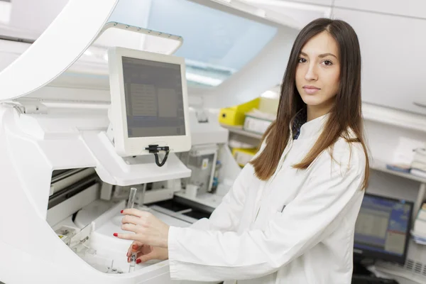 Young woman in the modern medical laboratory Stock Picture