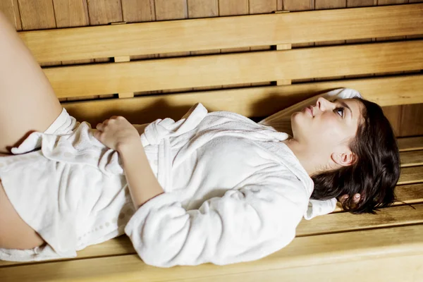 Young woman in the sauna — Stock Photo, Image