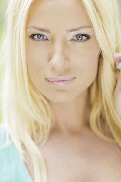 Portrait of the young blond woman Stock Photo