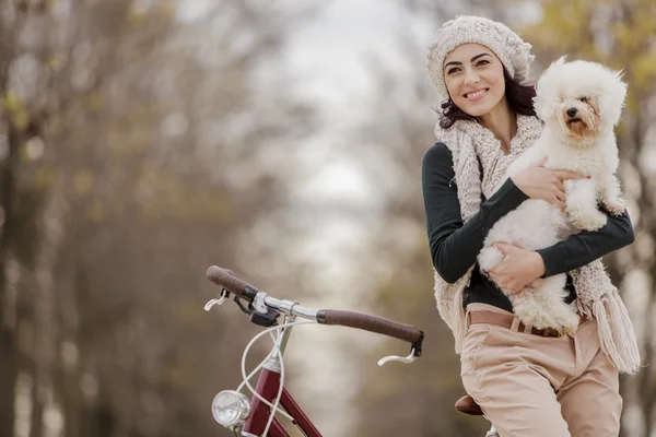 Young woman with a cute dog — Stock Photo, Image