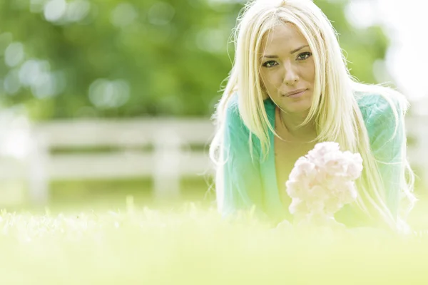 Young blond woman in the field — Stock Photo, Image