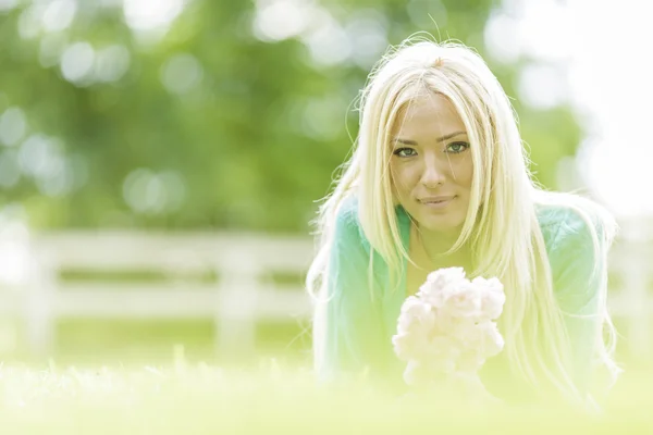 Young blond woman in the field — Stock Photo, Image