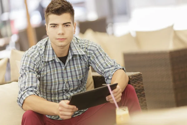 Young man with tablet